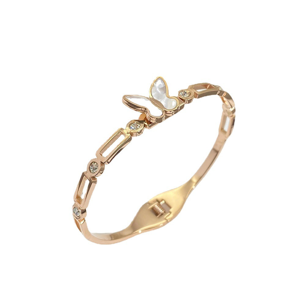 Bracciale a Polsino Minimalista a Farfalla da Donna in Acciaio al Titanio con Intarsi di Strass e Accenti in Madreperla, Finitura Placcata Oro