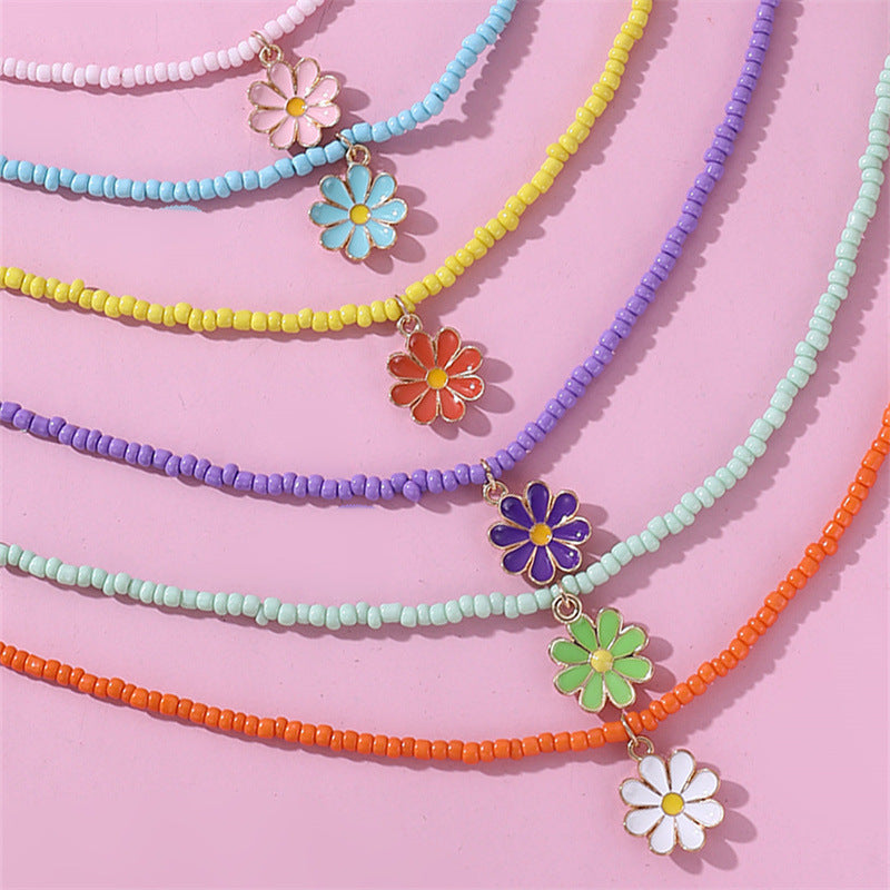 Precioso collar con colgante de lazo en tonos pastel para mujer, con abalorios de cristal y dije de aleación en una delicada cadena