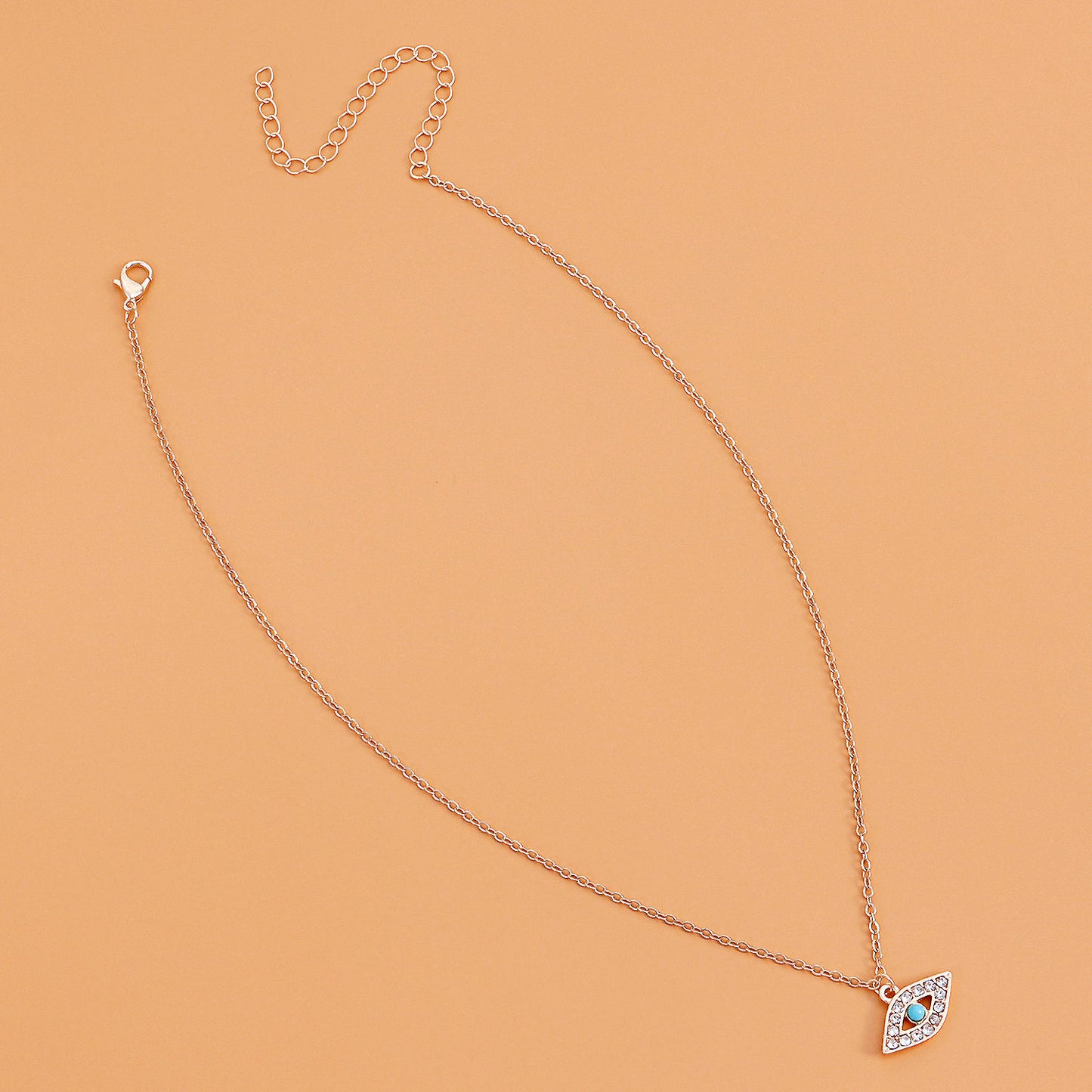 Punk Vintage Geometric Evil Eye Pendant Necklace for Women with Alloy Body, Rhinestone Inlay, and Plated Finish on Delicate Clavicle Chain