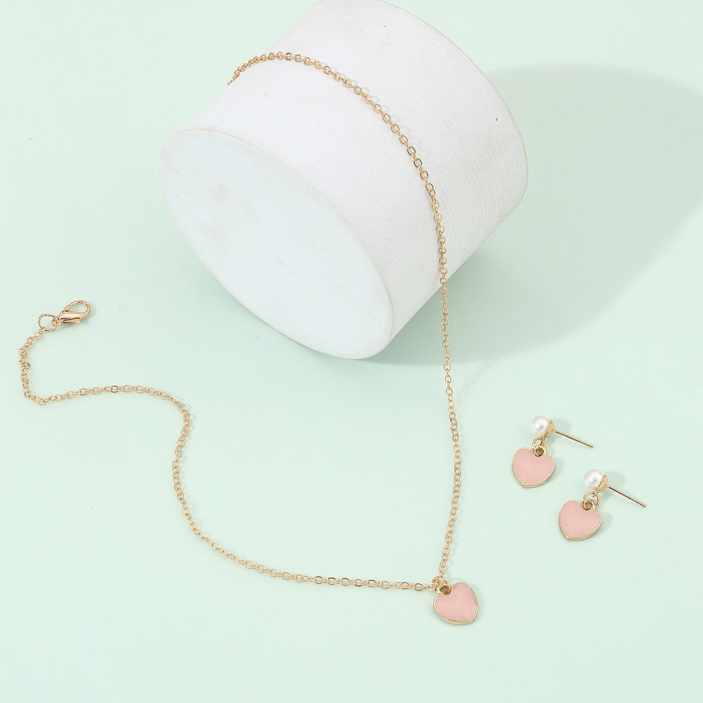 Set di collane minimaliste in lega a forma di cuore rosa per ragazze con catena a onda d'acqua