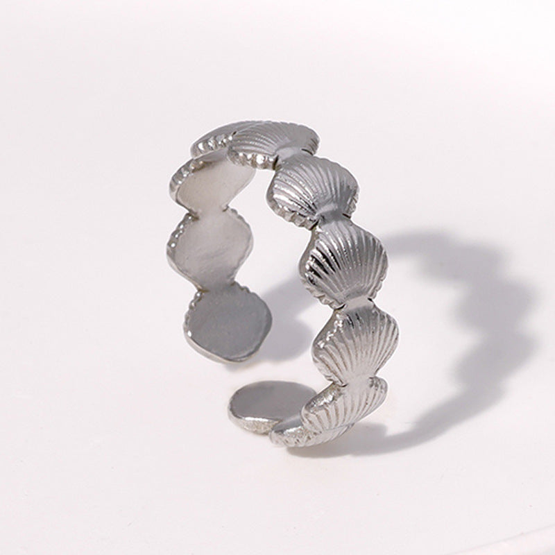Anello da donna in titanio e acciaio intarsiato a conchiglia, regolabile e minimalista