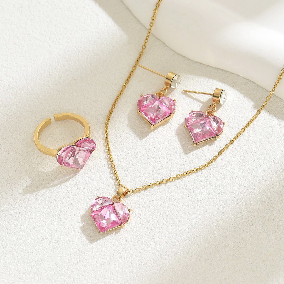 Conjunto de collar, pendientes y pulsera de cobre con circonitas incrustadas en forma de corazón para mujer