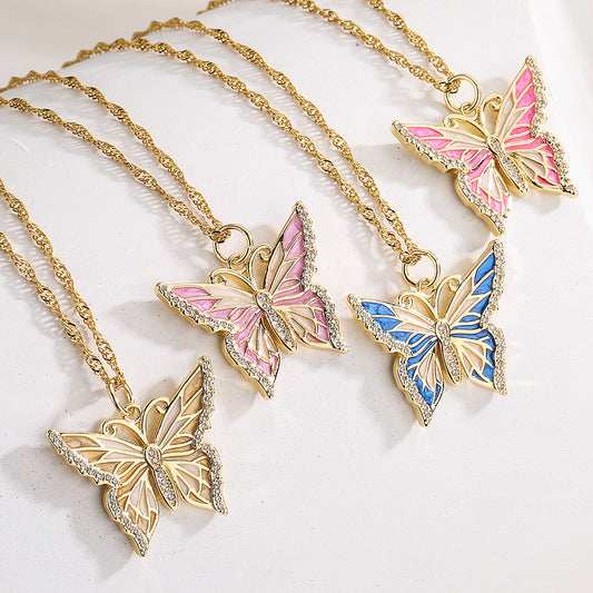 Collana pendente a farfalla minimalista da donna in rame placcato oro 18 carati e smalto, con zirconi cubici