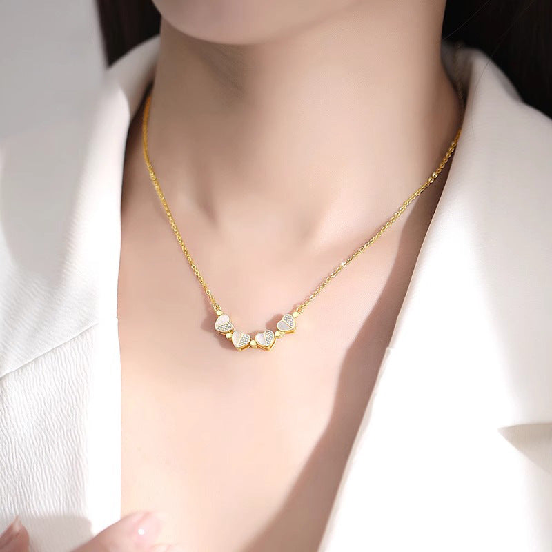 Collana con ciondolo a trifoglio dal design originale con ciondolo a cuore separabile in acciaio al titanio con finitura placcata su catena a O per donna e unisex