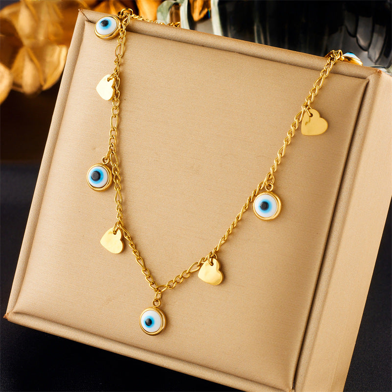Collar con colgante minimalista de mariposa y estrella a la moda con incrustaciones de diamantes de imitación en cadena de acero de titanio para mujer