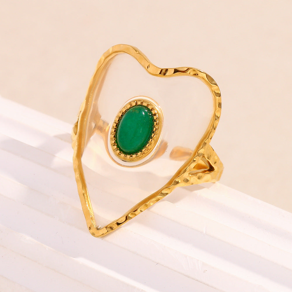Anello da donna alla moda a forma di cuore in acciaio inossidabile placcato oro 18 carati con accento verde in acrilico trasparente