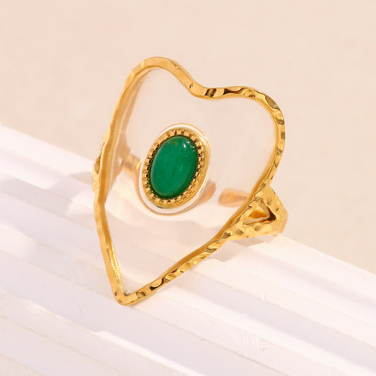 Anello da donna alla moda a forma di cuore in acciaio inossidabile placcato oro 18 carati con accento verde in acrilico trasparente