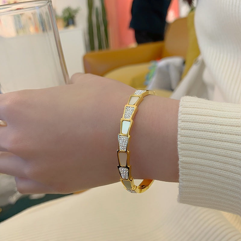 Bracciale Donna Minimalista in Titanio Placcato a Forma di Serpente con Zirconi