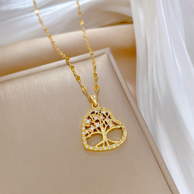 Collana con ciondolo albero della vita minimalista a forma di cuore da donna in acciaio al titanio con finitura placcata, catena sottile per clavicola