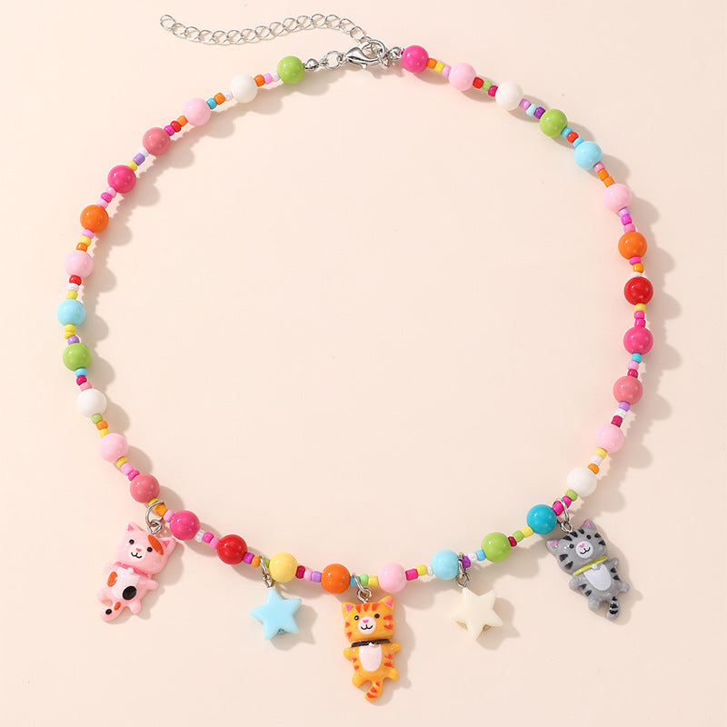 Collana con ciondolo a fiocco dolce pastello per ragazze con ciondolo in resina su catena a O, gioielli in stile cartone animato
