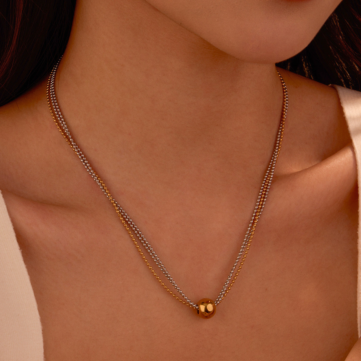 Collana da donna con ciondolo placcato in acciaio inossidabile geometrico alla moda con perle rotonde e design a linee pulite