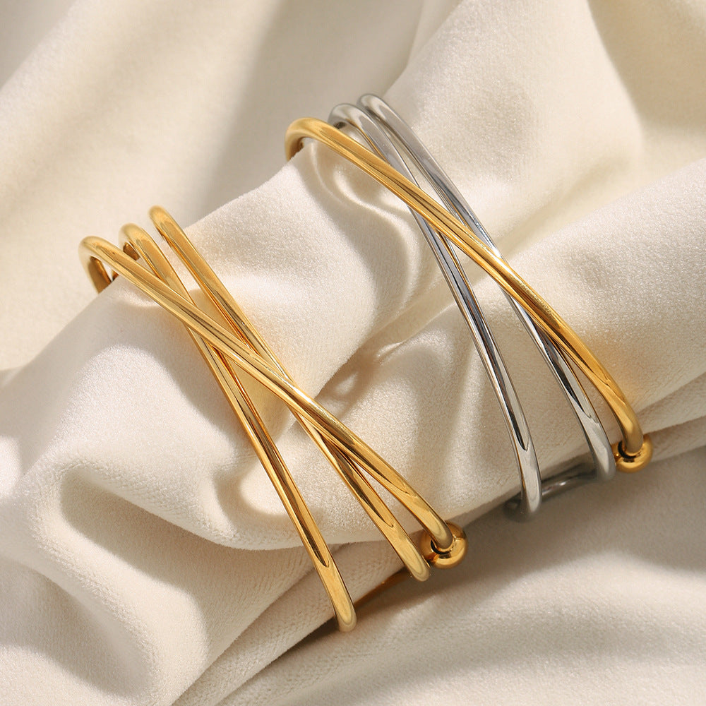 Bracciale da donna in acciaio inossidabile placcato oro 18 carati con design geometrico a linea incrociata, stile minimalista