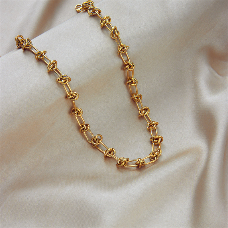Collana Punk Minimalista da Donna in Acciaio al Titanio con Nodo e Dettaglio a Spina