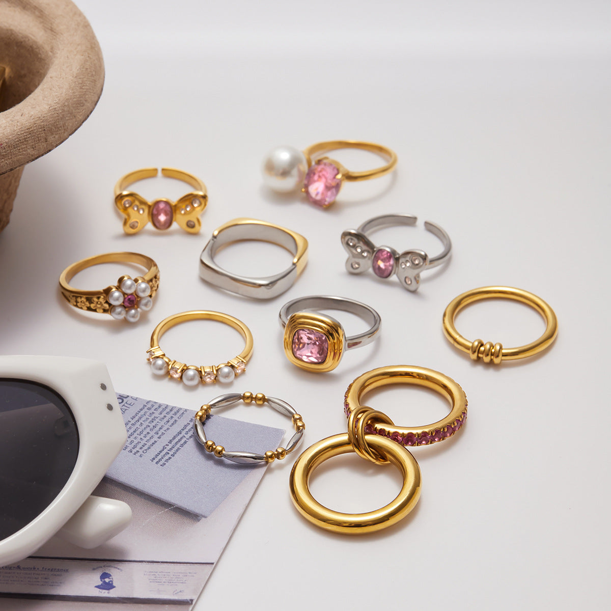 Anello da donna in acciaio inossidabile geometrico all'avanguardia con intarsio di zirconi rosa, gioielli di lusso elettrodeposti