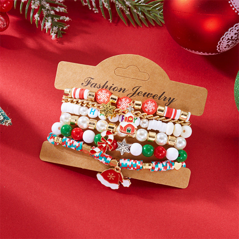 Pulsera minimalista con temática navideña con diseño de Papá Noel, bastón, muñeco de nieve, cuentas con letras y dije de aleación