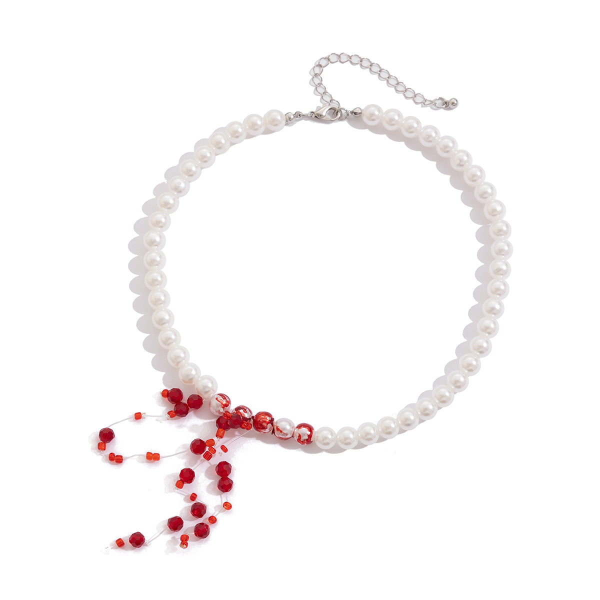 Collana con pendente a cuore e a goccia dolce e audace con perle imitation e strass, nappina e catena a sfere multistrato per donna