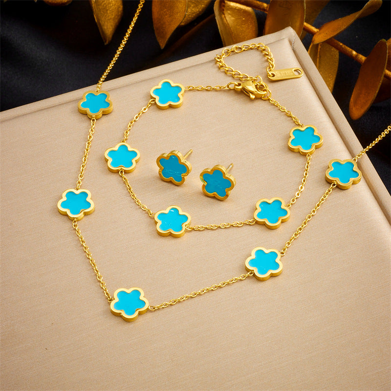 Set de pendientes, pulsera y collar chapados en acero inoxidable con diseño de flores vintage de cinco pétalos para mujer