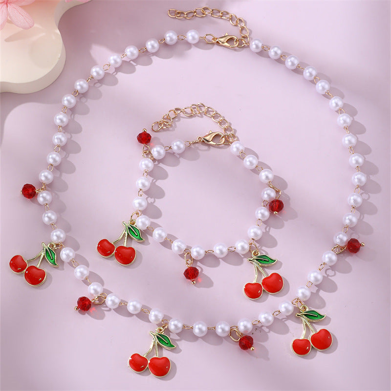 Set di Collana Minimalista a Forma di Fiocco in Resina con Perline a Ciliegia e Cuore per Ragazze, Gioielli Dolci Ispirati alle Perle