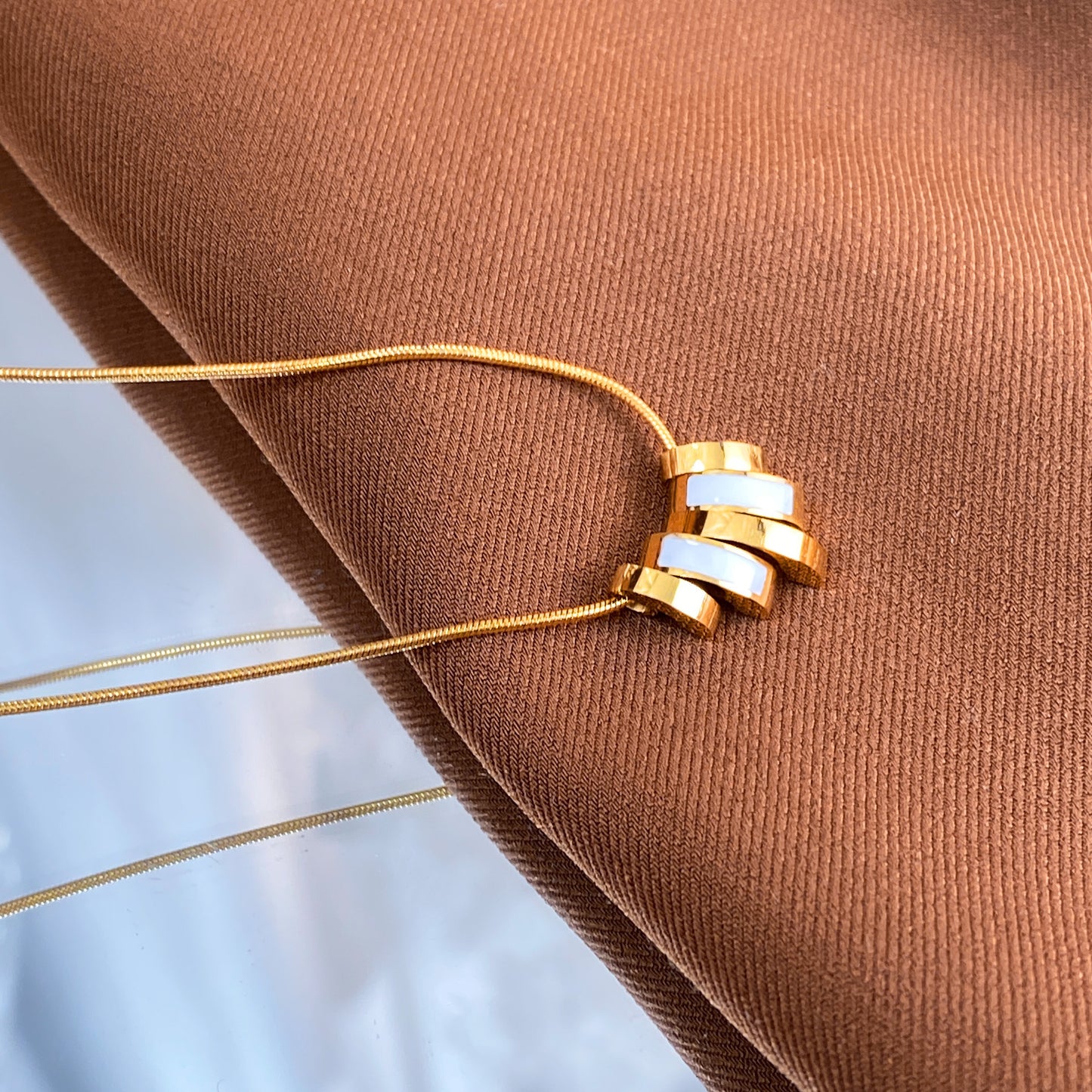 Minimalist Luxury Titanium Steel Plated Geometric Clover Pendant Necklace with Tassel for Unisex