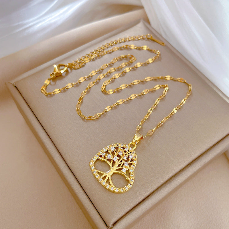 Collana con ciondolo albero della vita minimalista a forma di cuore da donna in acciaio al titanio con finitura placcata, catena sottile per clavicola