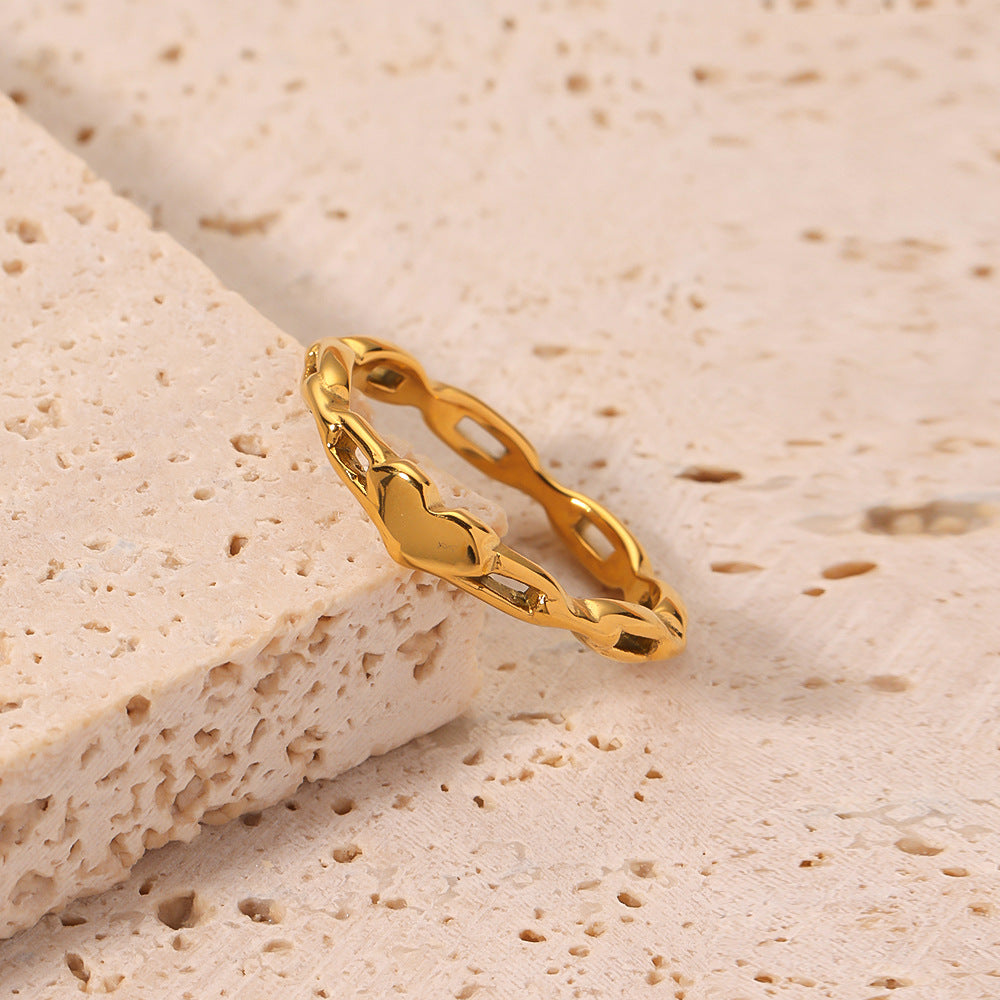 Anello da donna in acciaio al titanio placcato oro 18 carati con catena a cuore vuota alla moda