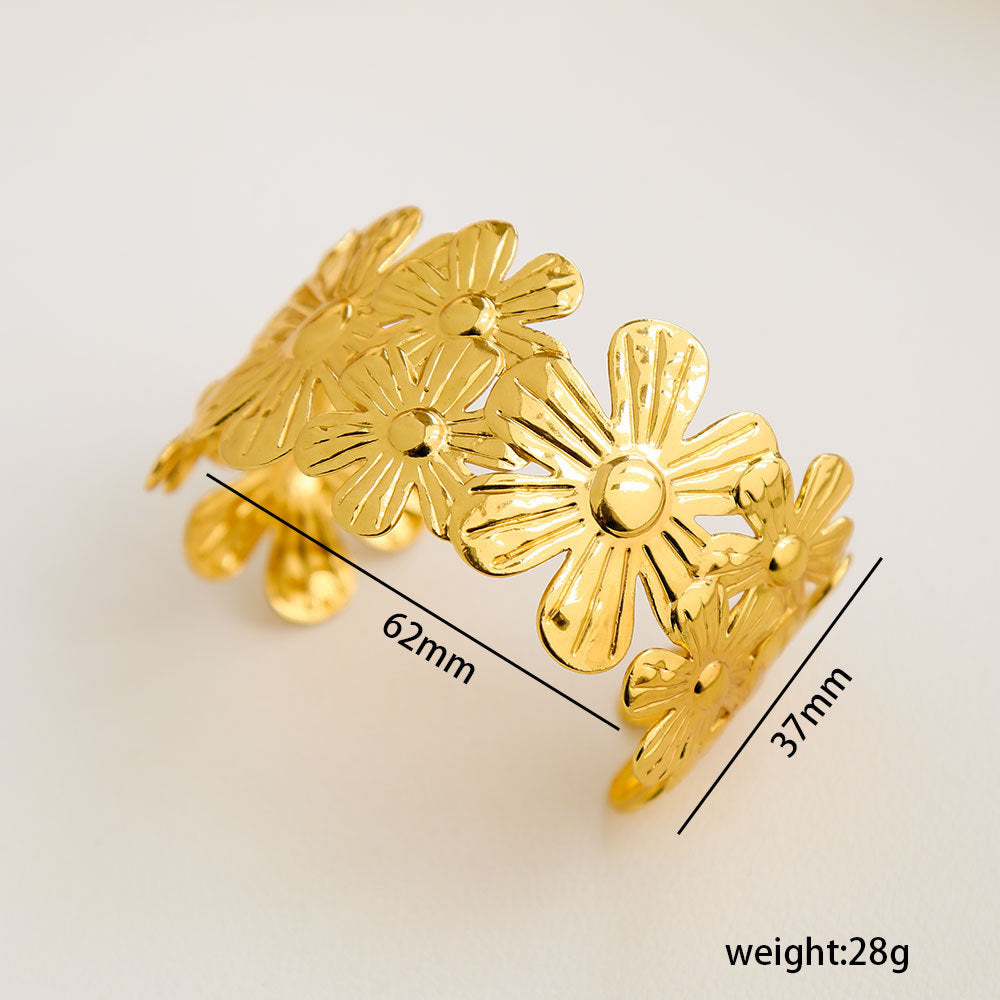 Bracciale Minimalista Ispirato alla Francia in Acciaio Inossidabile con Trafori a Motivi Floreali di Foglie e Girasoli