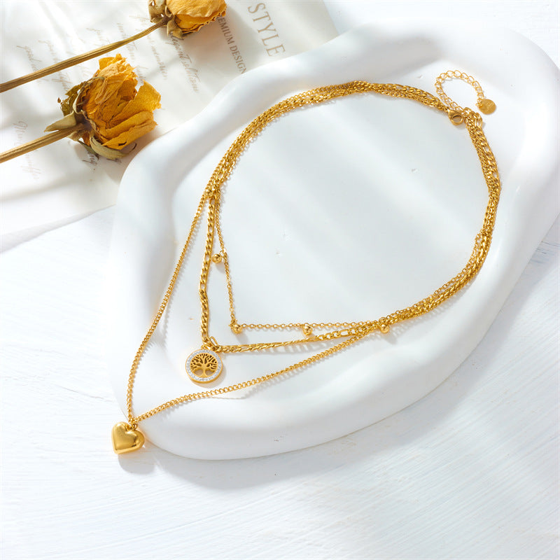 Collar minimalista vintage de titanio y acero con colgante multicapa de corazón del Árbol de la Vida y acabado chapado