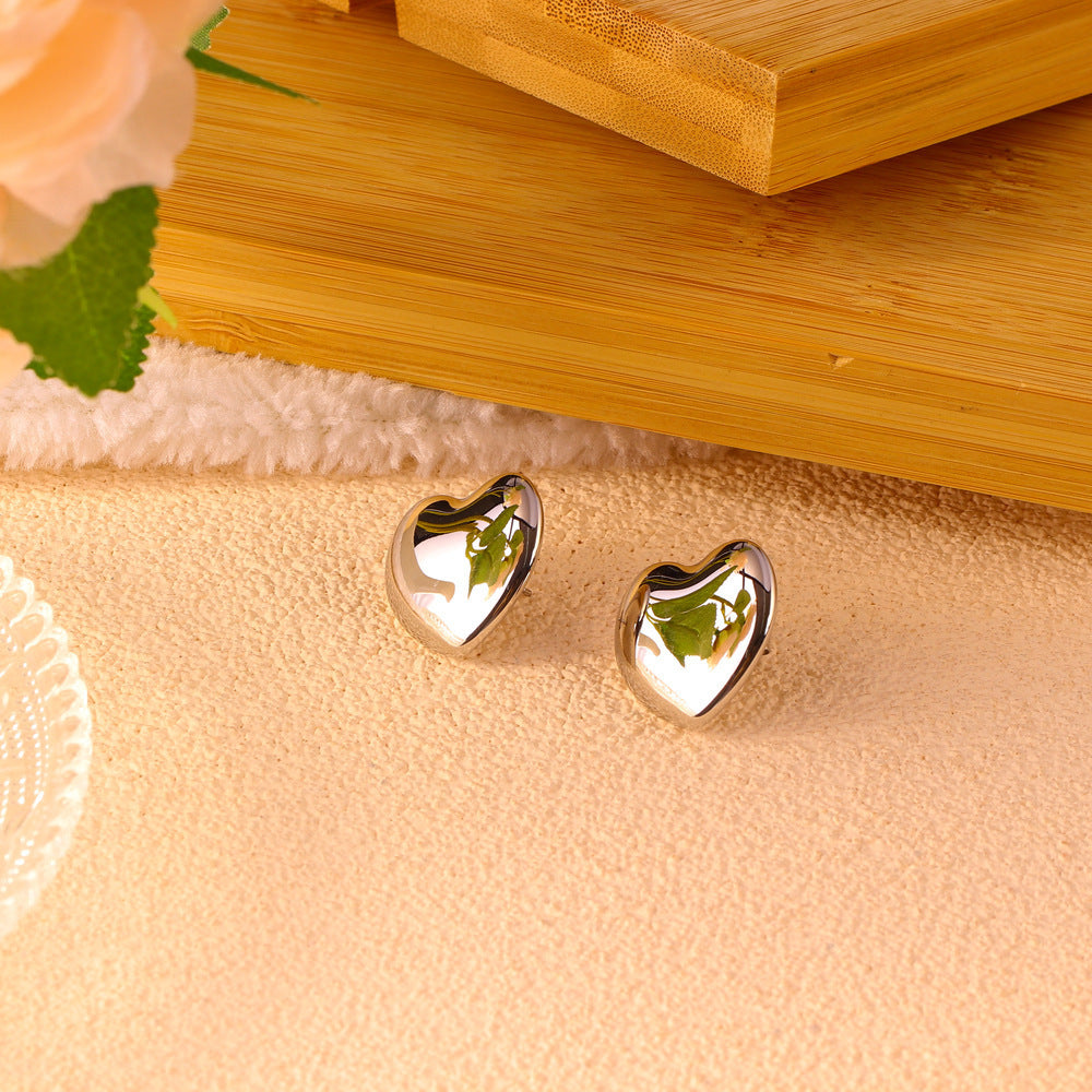 Elegantes pendientes de acero inoxidable con forma de corazón para mujer con acabado chapado