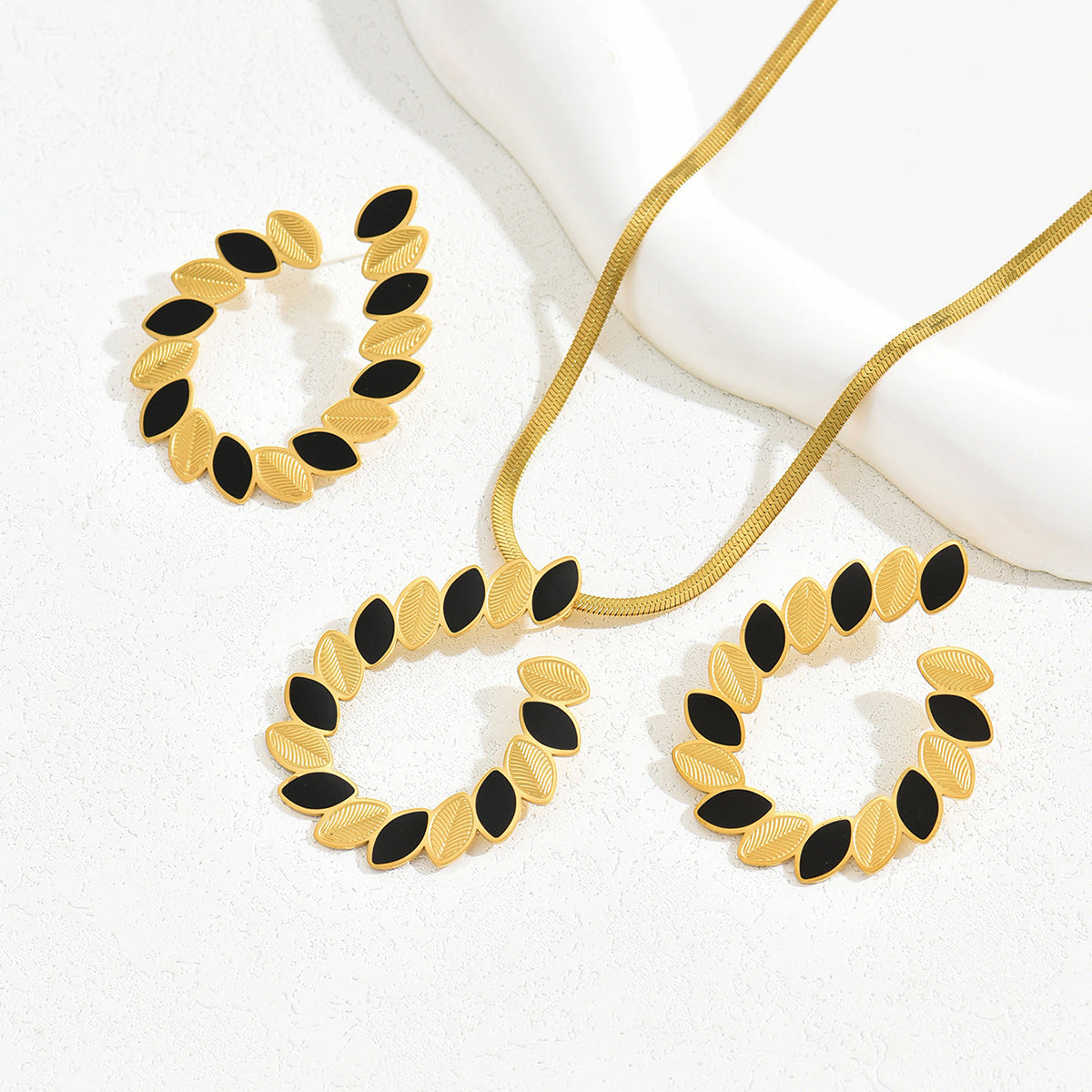 Conjunto de collar largo y pendientes de moda para mujer con diseño de hojas en cobre con acabado esmaltado