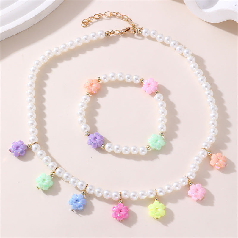 Dulce juego de collar y pulsera de cristal con nudo floral para niñas con colgante de aleación en colores pastel de helado