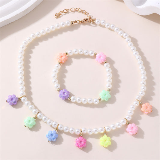 Dulce juego de collar y pulsera de cristal con nudo floral para niñas con colgante de aleación en colores pastel de helado
