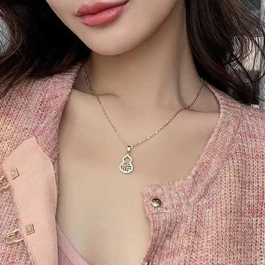 Minimalist Hollow Carved Calabash Pendant Necklace in Titanium Steel with Gold Plating for Men