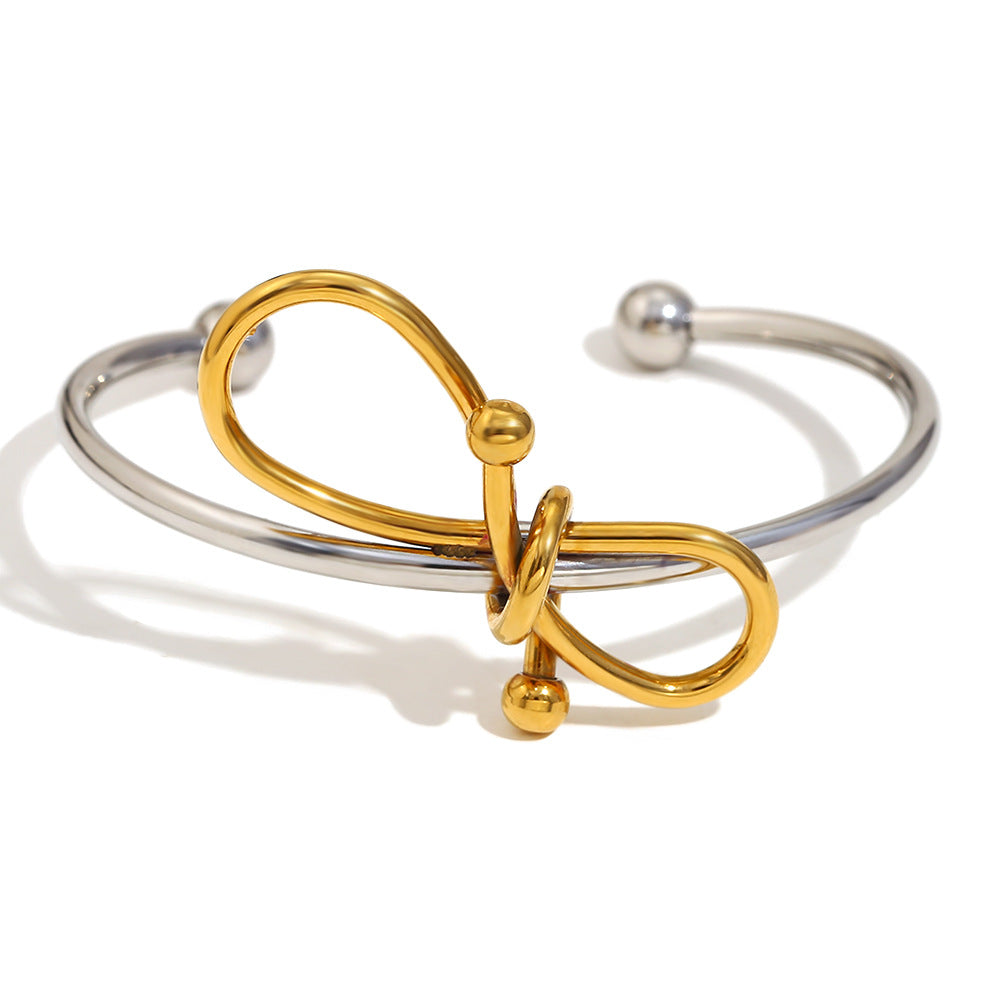 Bracciale da donna in acciaio inossidabile placcato oro 18K con fiocco, stile minimalista e alla moda