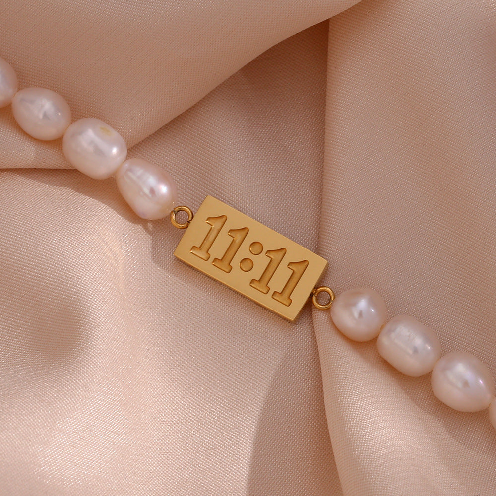 Bracciale da donna placcato in acciaio inossidabile geometrico alla moda con accento di perla d'acqua dolce