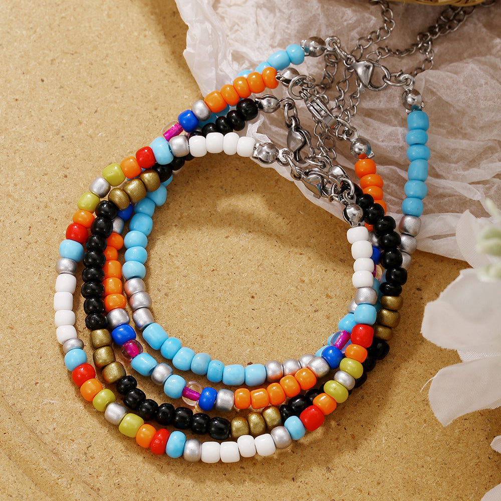 Braccialetto e Cavigliera Multi-strato Boho con Perline Rotonde Artigianali Accessorio Moda