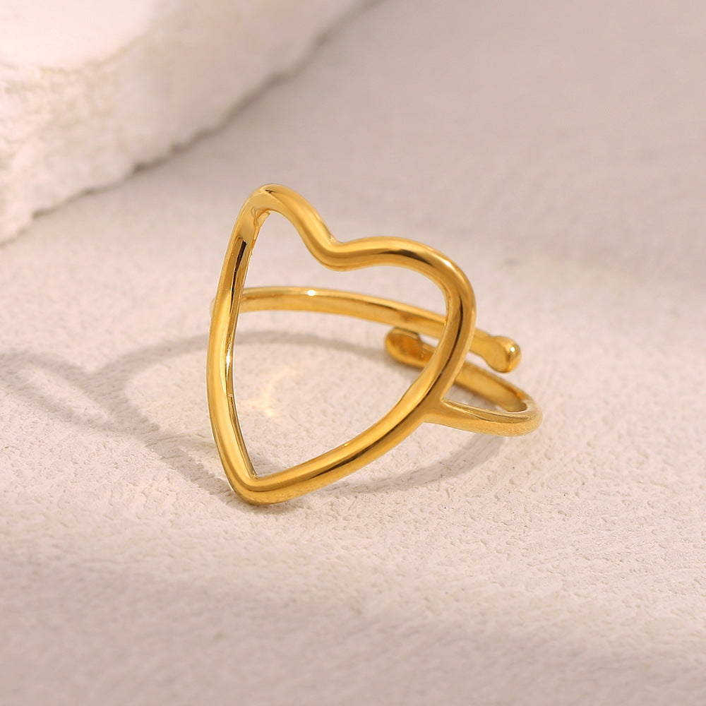 Anello in acciaio inossidabile a forma di cuore minimalista con placcatura in oro 18 carati, design a fascia aperta cava da donna