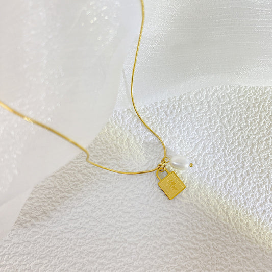 Minimalist Geometric Stainless Steel Pendant Necklace for Women with Snake Chain and Lucky Lock Design