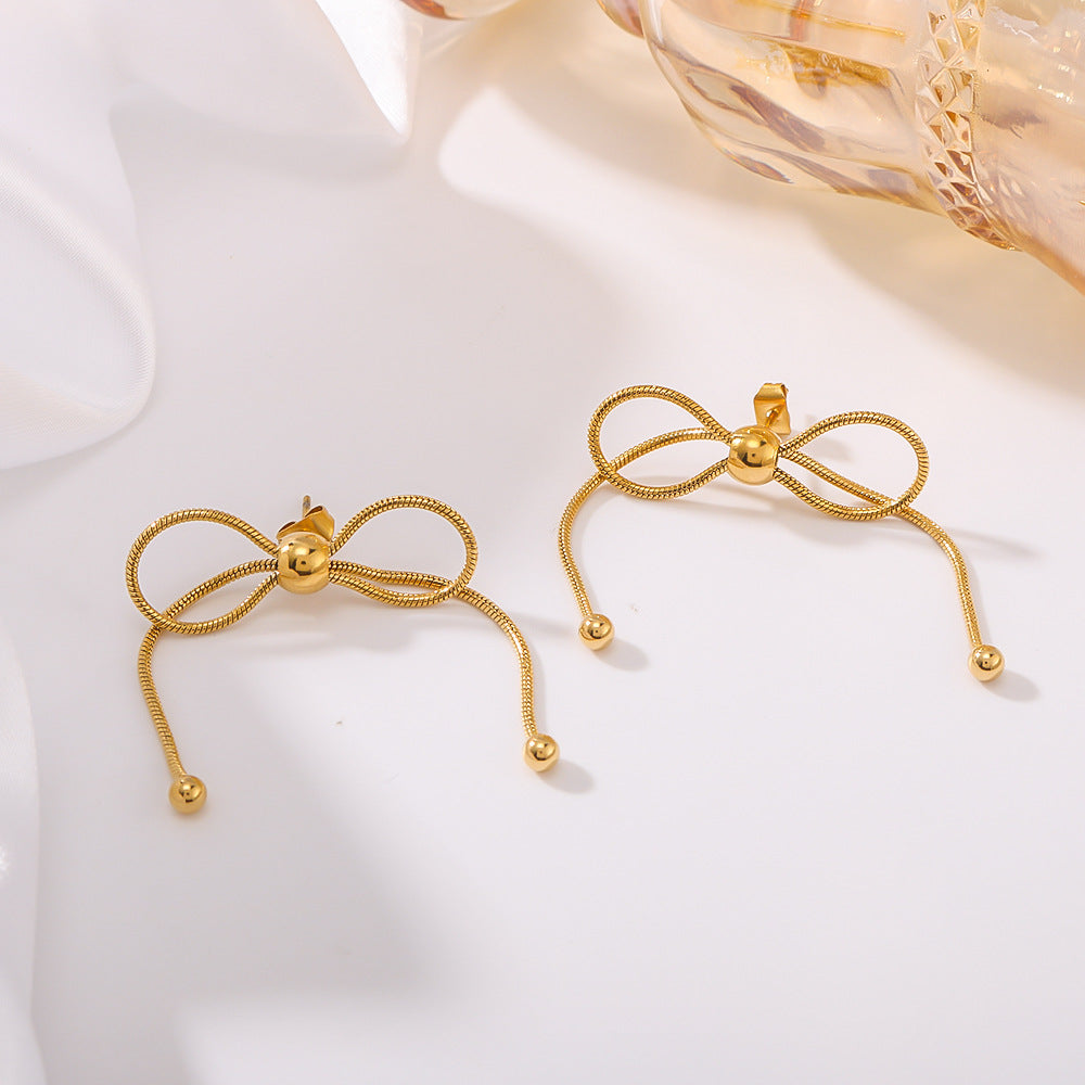 Minimalist Bow-Shaped Stainless Steel Earrings with Pull-Through Design and Tassel Details
