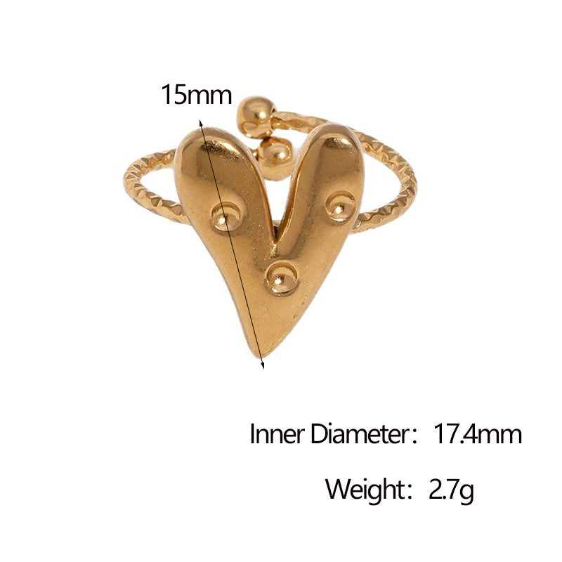 Anello da donna minimalista a forma di cuore in acciaio al titanio con placcatura in oro 18 carati e intarsio di strass