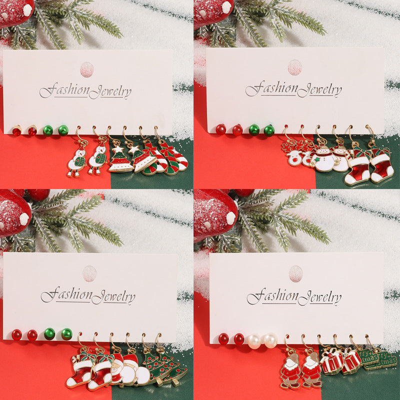 Juego de pendientes de aleación con temática navideña para mujer con dijes esmaltados de ciervo y Papá Noel, diseño geométrico, acabado chapado