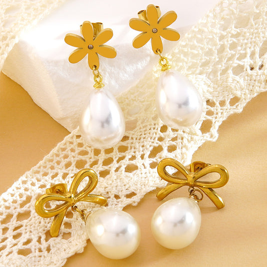 Orecchini placcati in acciaio inossidabile con fiore geometrico ed elegante fiocco, pendente con perla, stile vintage
