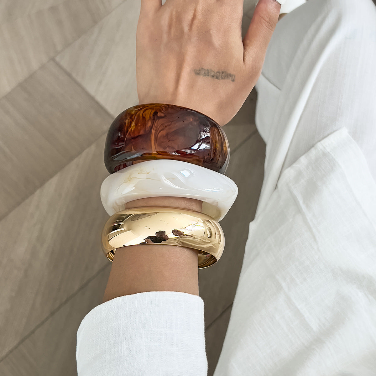 Irregular Marbled Resin Wide-Band Mirror-Finish Retro Bracelet for Women with Plated Finish