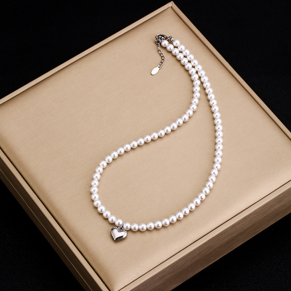 Collar con colgante de moda de acero de titanio sólido pulido con forma de corazón para mujer con cadena tipo O