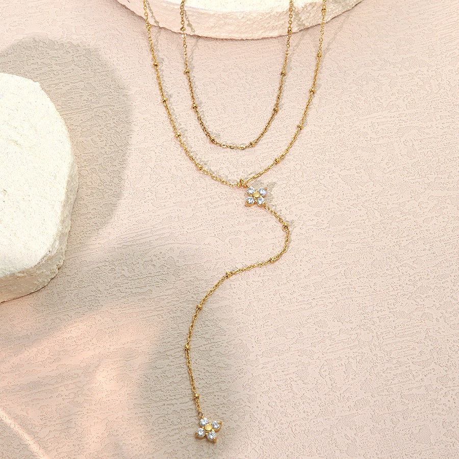 Collana a Nappa da Donna placcata in Acciaio Inox di Lusso con Zirconi Cubici e Motivo Floreale