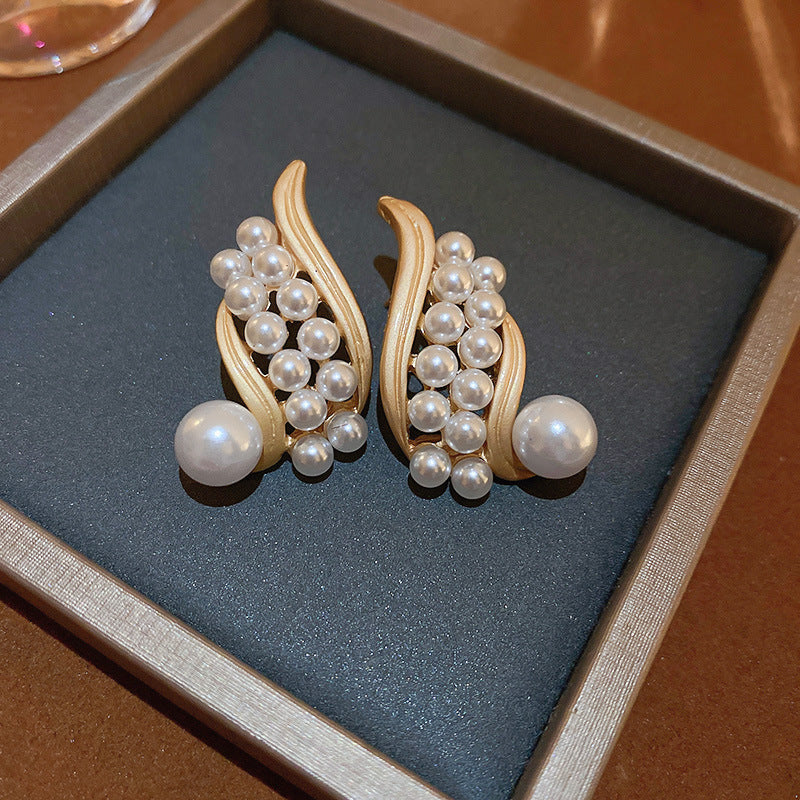 Chic Vintage Pearl Stud Earrings with Floral Bow Leaf Diamond Drop Geometric and Animal Motifs in Steel Posts