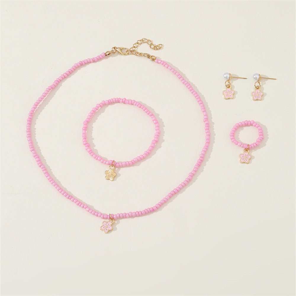Set di collana con perline di vetro floreali minimaliste carine con bracciale anello e orecchini abbinati per bambini