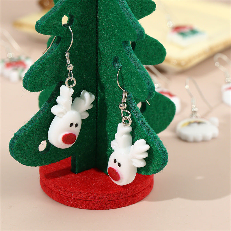 Set de pendientes infantiles con temática navideña con copo de nieve, cascabel y colgante de árbol de Navidad en material de resina