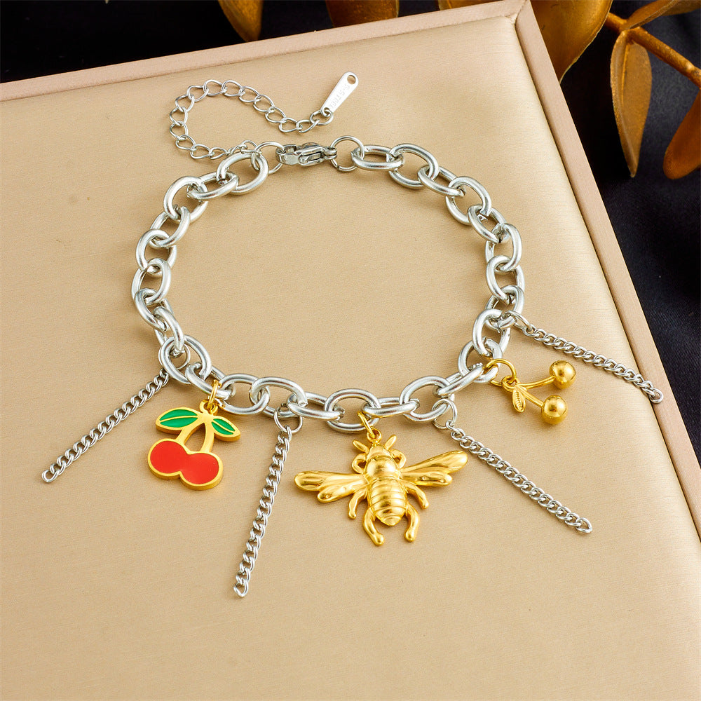 Bracciale unico in acciaio inossidabile color-block con ciondoli a forma di ape, fiore, stella marina e ciliegia