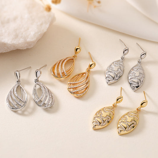 Orecchini da donna minimalisti geometrici asimmetrici a forma di goccia in zirconia su rame placcato oro