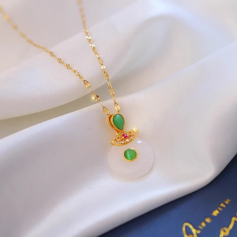 Collana con Ciondolo Occhio di Gatto Floreale Minimalista in Acciaio al Titanio con Finitura Placcata su Catena ad O per Donne e Uomini